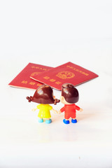 The two dolls symbolize marriage and love before the marriage certificate