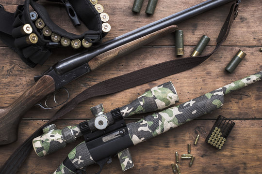 Small caliber 22 long rifle and double-barreled hunting rifle