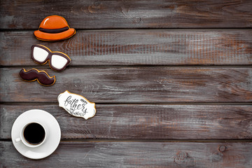 design for Father Day celebration party with cookies, gift box and coffee on wooden background top view mock up