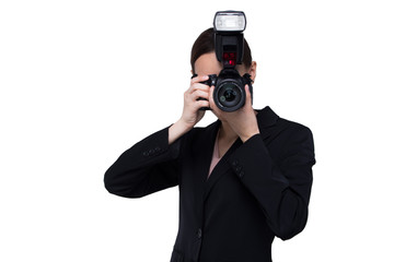 Asian Woman Photographer hold camera with external flash point to shoot subject, wear normal suit...