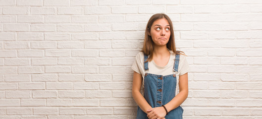 Young hipster woman thinking about an idea