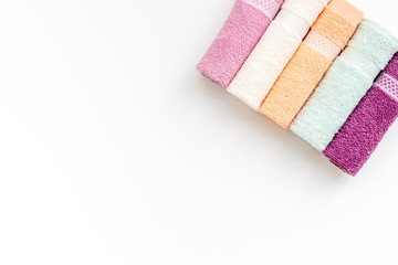 Bath accessories made of cotton set with towels on white background top view mockup