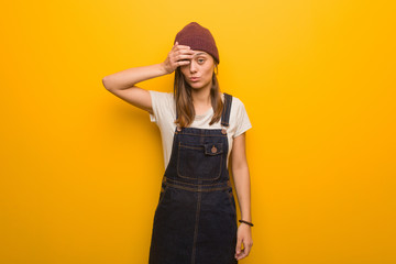 Young hipster woman worried and overwhelmed