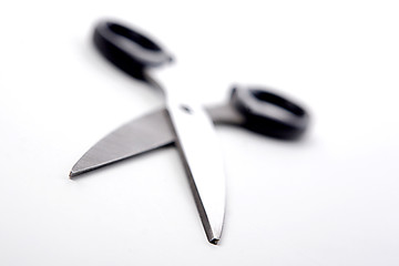 Close up of sharp scissors on white background.