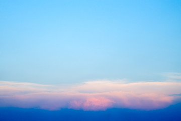 Colorful clouds on blue sky with copy space 