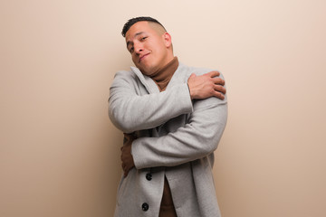 Young latin business man giving a hug
