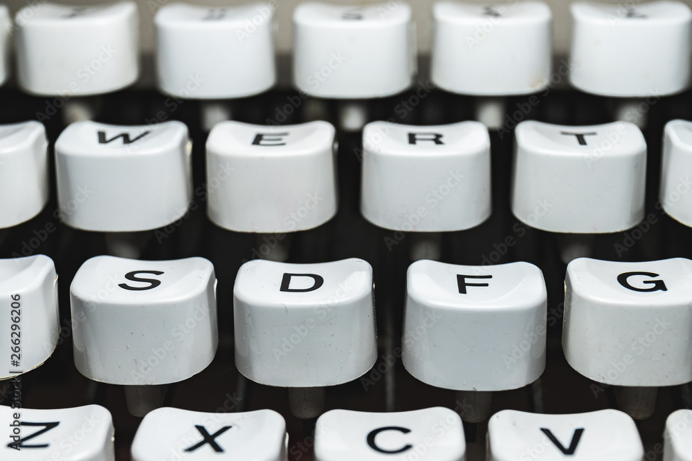 Fototapete typewriter characters whites details macro icon and letters on retro machine keyboard