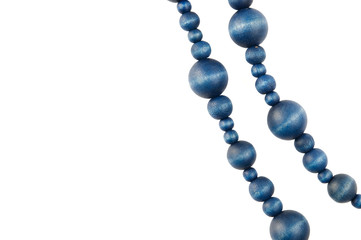 Wooden blue pearl necklace isolated on white background