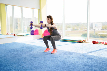 Woman fitness. beautiful Caucasian senior woman doing exercise in gym . healthy lifestyle