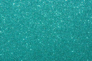 blue glitter macro background. Close-up shot of glittery texture.