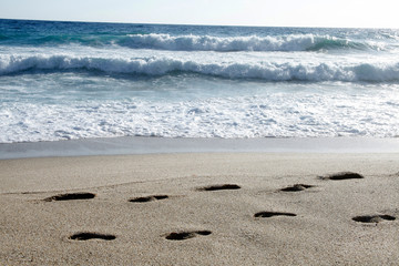 footprints on the beach