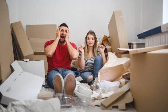 Young couple moving to a new apartment