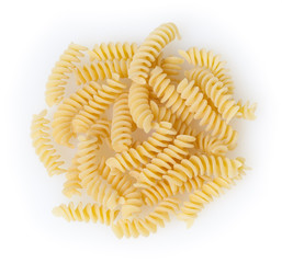Uncooked fusilli pasta isolated on white background with clipping path
