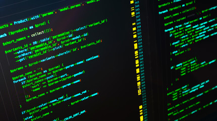 Green php code on dark background in code editor, macro