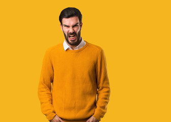 Obraz premium Young natural man screaming very angry and aggressive