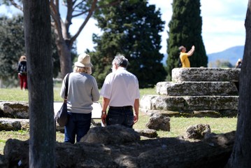 tourists visit an archaeological site in italy 2019