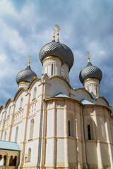 Fototapeta na wymiar Russian orthodox church with onion domes. Rostov Kremlin