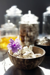 White clay filler or soft prepared chalk or clay rich in coconut shell bowls. Old traditional spa in Thailand.