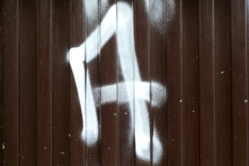 A simple letter A painted on a wall.