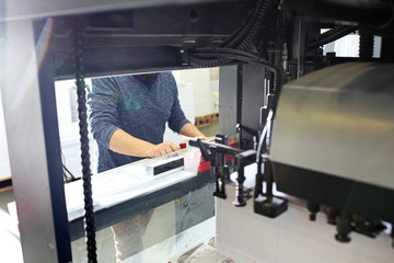 Printer. The printer supports the control panel, supervises the printing process