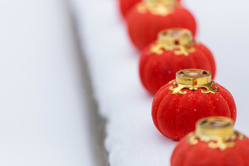 Red lanterns in the snow