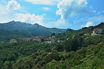 Fototapeta na wymiar Italy-outlook of the town Marciana and mountain Monte Capanne on the island of Elba