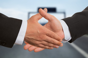 Closeup of two businessmen shaking hands