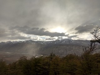 sun in the mountains