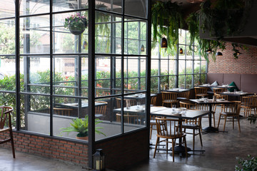 dining room with table and chairs in a restaurant 
