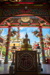 Chinese temple with Buddha at sunny day