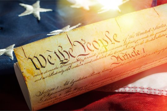 Roll of vintage US Constitution, Patriotism, Fourth of July background