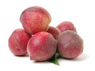ripe peach on white background