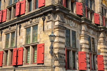 Details of the external facade of the Town Hall (rebuilt in 1629) in Delft, Netherlands, with carvings
