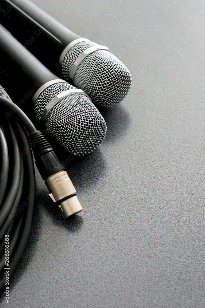 Wall mural radio microphones. wireless sound transmission system. microphones are on the audio wires. soft focu