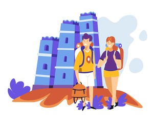 Tourism sightseeing couple with backpacks ancient castle