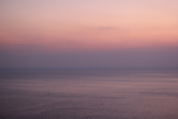 The sky and the sea at sunset. Skyline. Beautiful tones. Background
