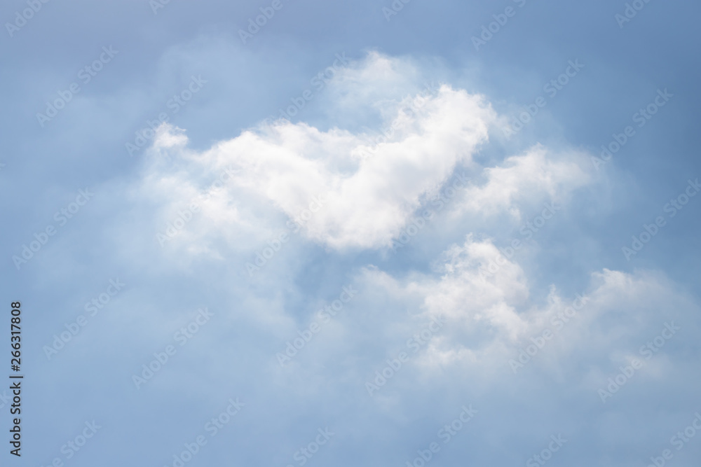 Wall mural white cloud background and texture on blue sky. strange cloud shape.