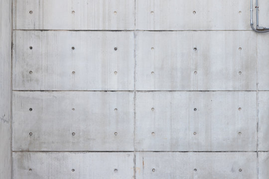 bare concrete wall with symmetry line, free copy space for text. pre cast concrete panel.