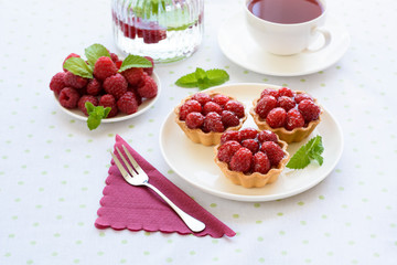 Fruit raspberry cakes on a table