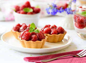 Fruit raspberry cakes on a table
