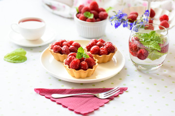 Fruit raspberry cakes on a table
