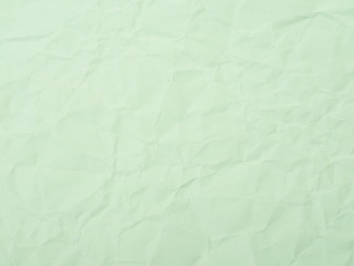 Fototapeta premium Green crumpled paper texture background