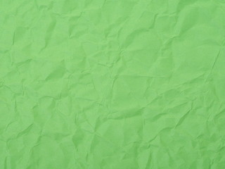 Green crumpled paper texture background