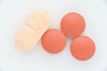 Pills on a light background close up. View from above.
