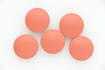 Pills on a light background close up. View from above.