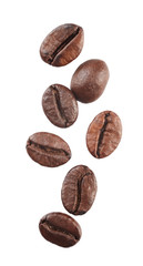 Falling coffe beans isolated on white background. Close up.