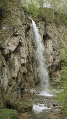 Obraz na płótnie Canvas Waterfall in the highlands.