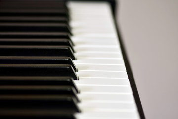 Keys of a digital piano, soft focusing, creative mood of a person improvisation and creativity....