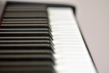 Keys of a digital piano, soft focusing, creative mood of a person improvisation and creativity....