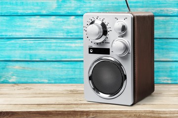 Old retro radio  on background